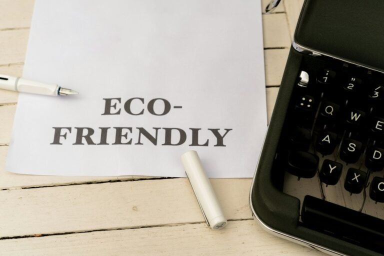 How can Shotscribus software help the environment: an eco-friendly paper note next to a typewriter