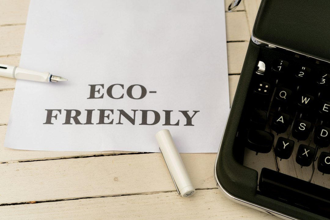 How can Shotscribus software help the environment: an eco-friendly paper note next to a typewriter