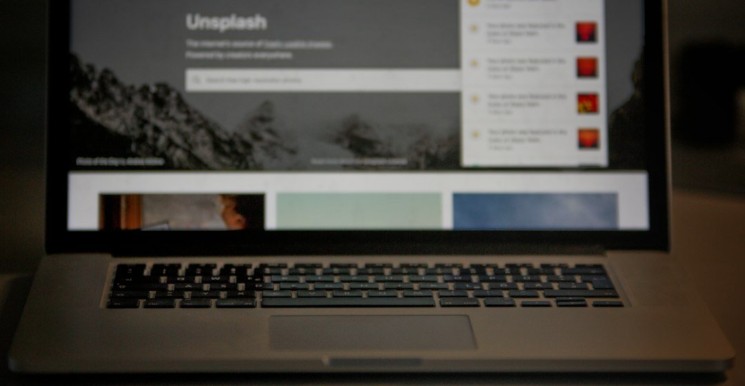 Open laptop on a table used to check a website for a feedbuzzard code